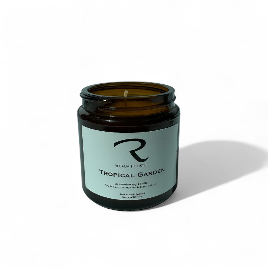 Tropical Garden candle with Recalm Holistic label on a white background