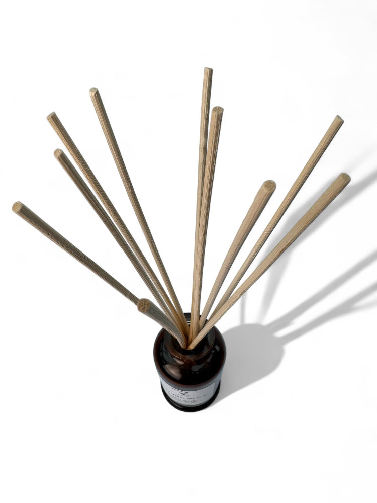Reed diffuser with wooden sticks in a in Italian Inspired Apothecary Glass Vessel with Rattan Reeds 100% Natural