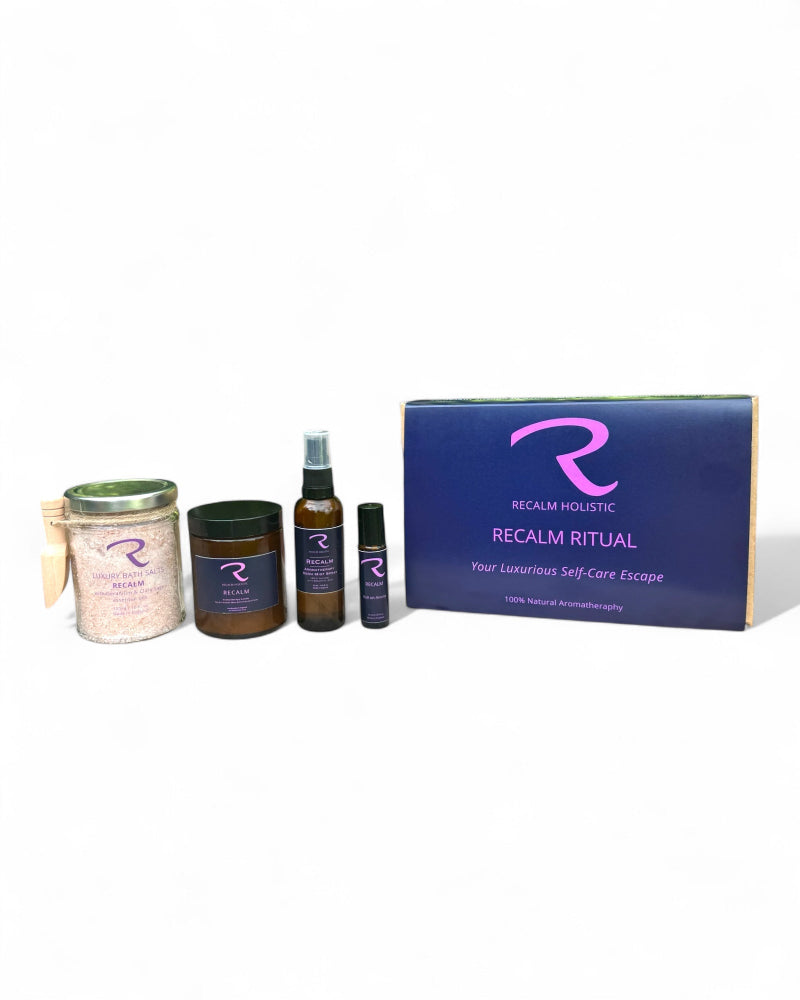 ReCalm Holistic Collection of self-care products with a branded box, with 'R' Logo, writing Your Luxurious Self-Care Escape