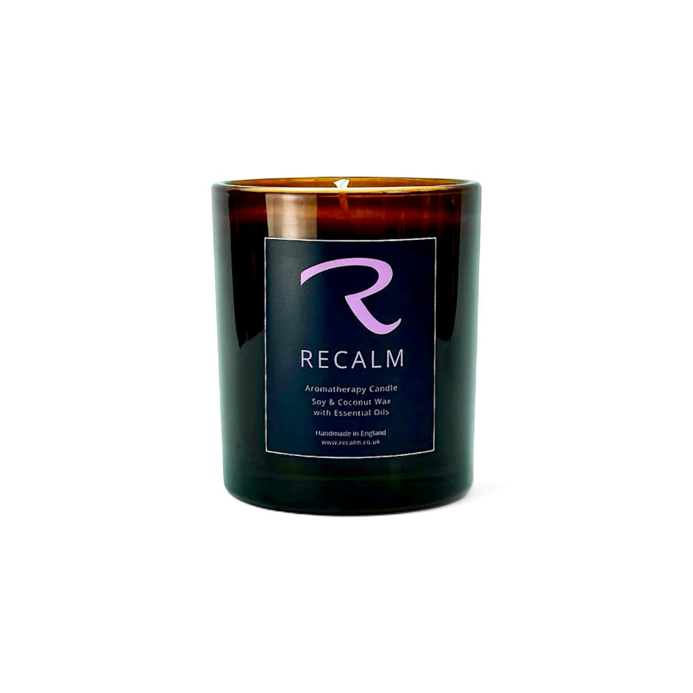 ReCalm Aromatherapy Candle with pure essential oils of Geranium, Clary Sage and Rosemary to ground your emotions, calm your nervous system and transport your senses to a luxury spa