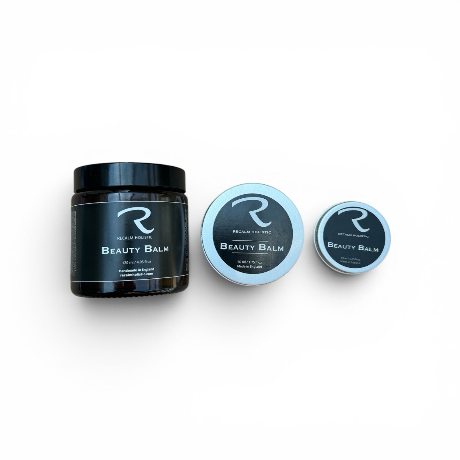 Comparison photo of ReCalm Beauty Balm available in three sizes: a travel-friendly 15ml tin, a 50ml tin, and a large 120ml glass jar, with prices starting from eight pounds.