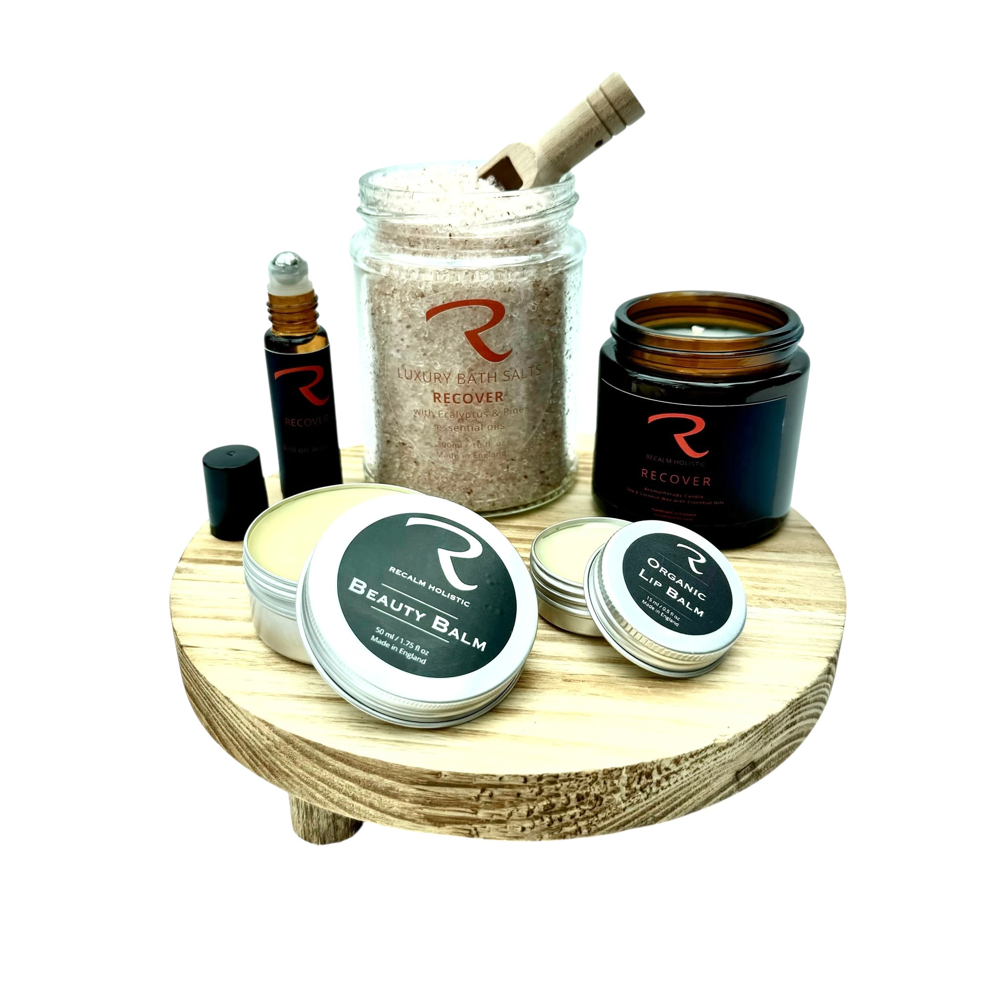 Aromatherapy Spa products called Recover, Bath salts, Aromatherapy Candle, Pulse points, Beauty Facial Balm and Lip Balm
