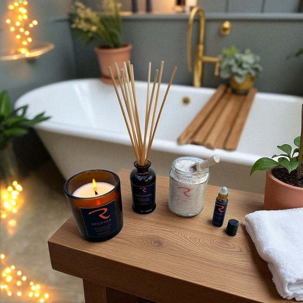 A luxury bathroom setting showcasing the ReCalm Holistic natural aromatherapy candle and botanical skincare range.