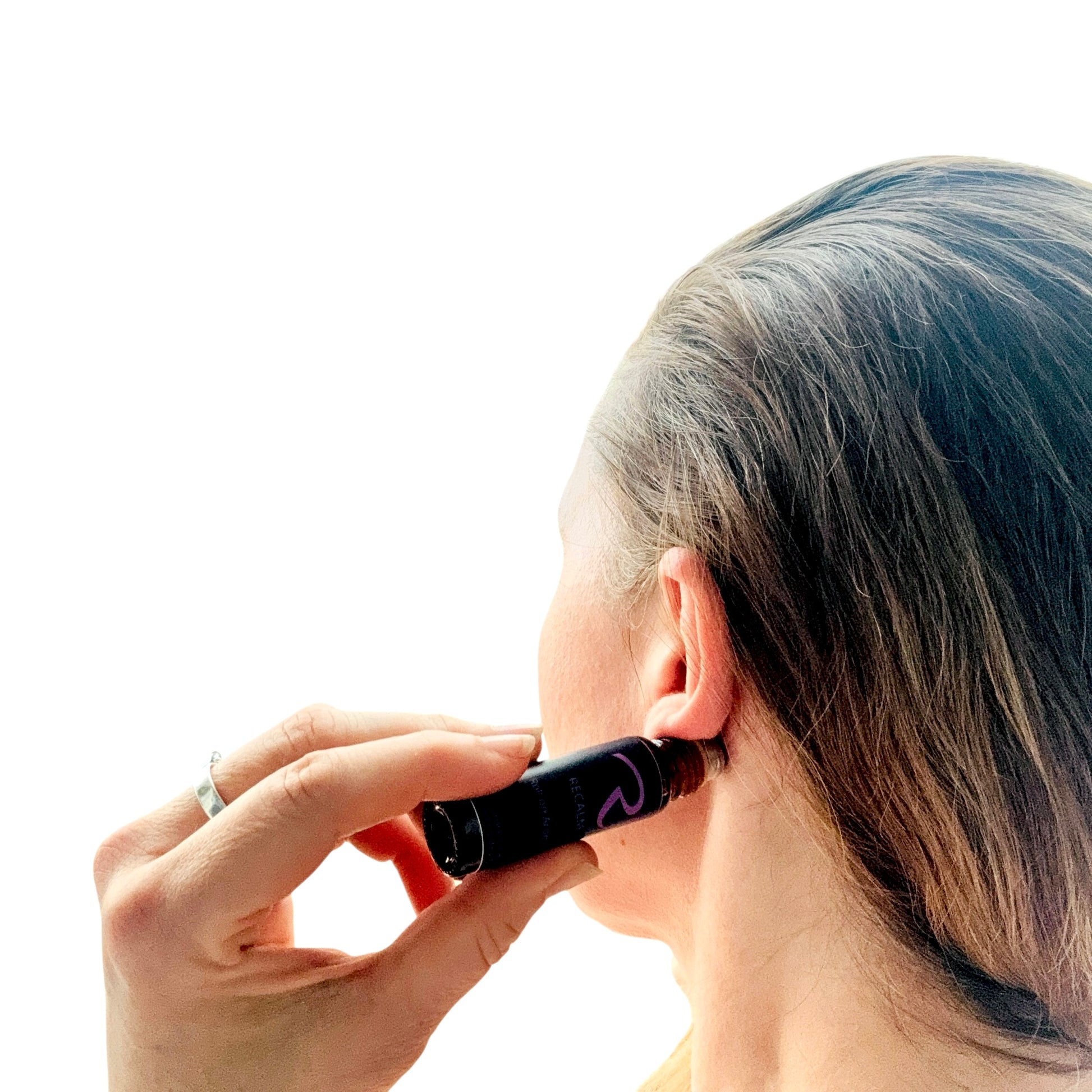 Application of ReCalm Holistic Roll on Aroma Calming Body Oil