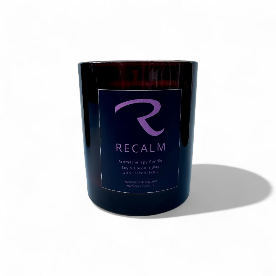 Women's Balance Aromatherapy Candle in Amber Glass Jar, Support your wellbeing with our Women's Balance collection called ReCalm, designed to elevate stress and calm your senses, with purple ReCalm Design label on elegant Glass Amber Jar