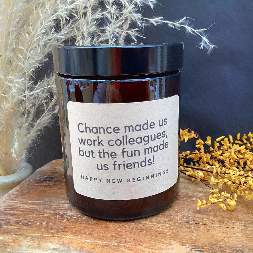 Jar with a motivational label on a wooden surface with decorative elements