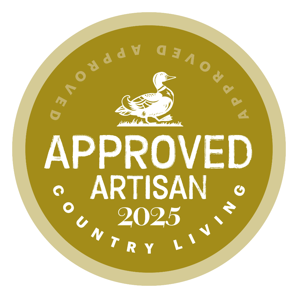 Approved Artisan 2025 badge with a duck illustration on a green background Country Living Marketplace Approved 