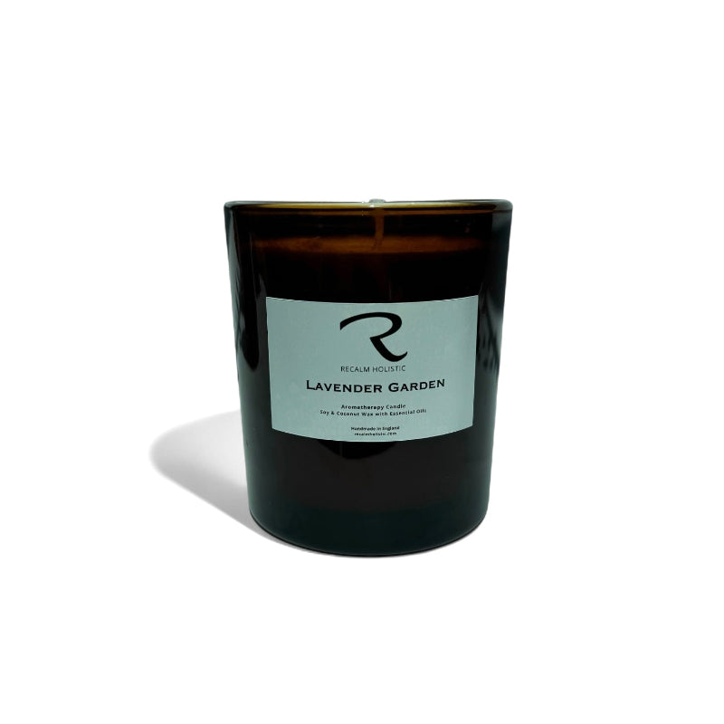 Lavender Candle with pure essential oils, by ReCalm Holistic, in large candle vessel 300ml, thick luxury amber glass vessel with white label and ReCalm Holistic 'R' Logo