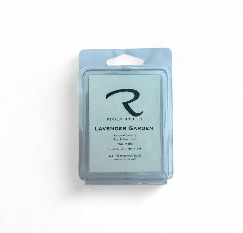Packaged wax melts with 'Recalm Holistic' branding on a white background