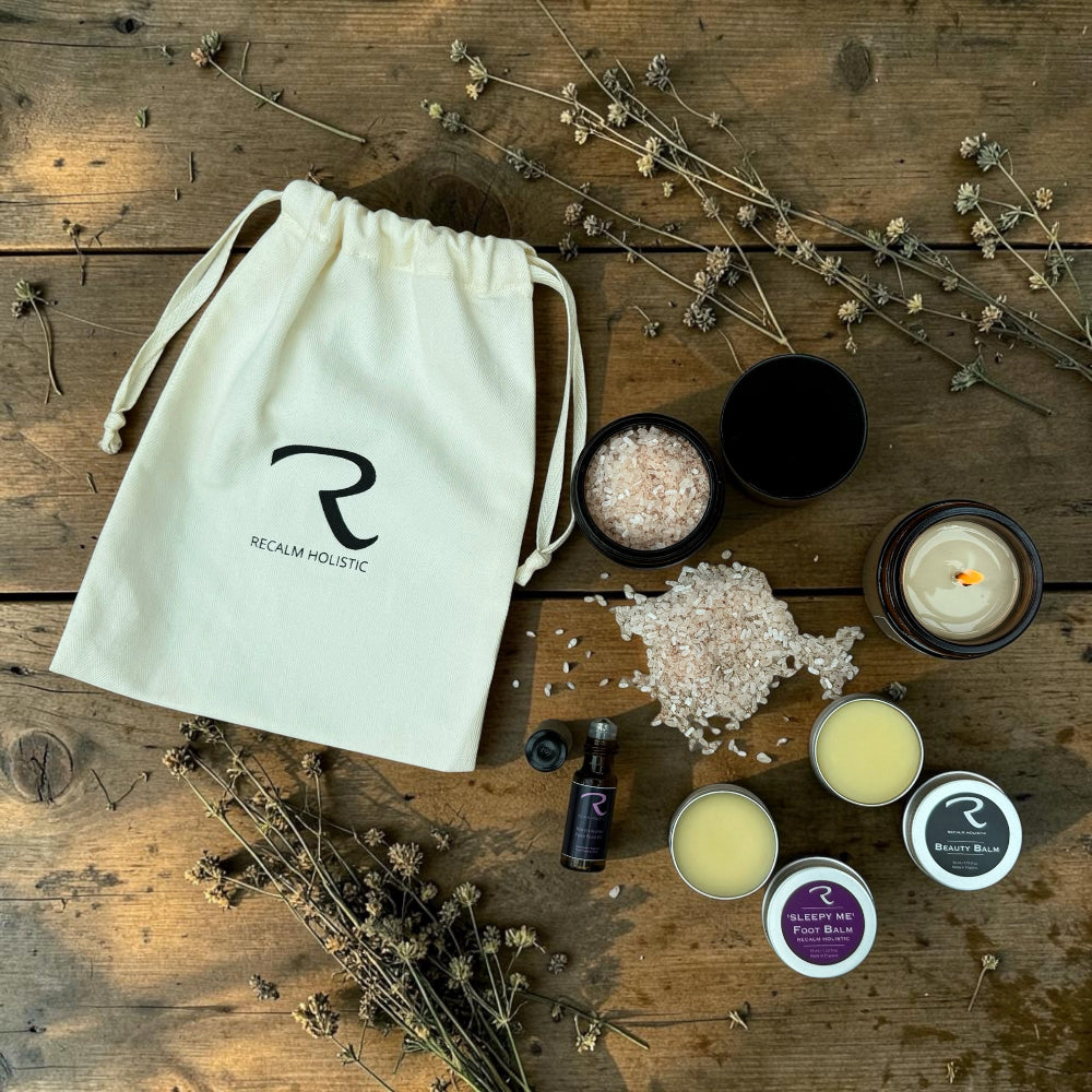 My little Recalm Ritual Collection of five Essential Miniatures of ReCalm Holistic's Best Sellers, including ReCalm Aromatherapy Roller Ball for Pulse Points, ReCalm Botanical Bath Salts, ReCalm Beauty Balm, Sleepy Me Balm and beautiful Cotton Drawstring pouch to keep it al inside. You can create your weekly ReCalm Ritual with this collection of miniatures, making the perfect gift for friends and family, just stunning.