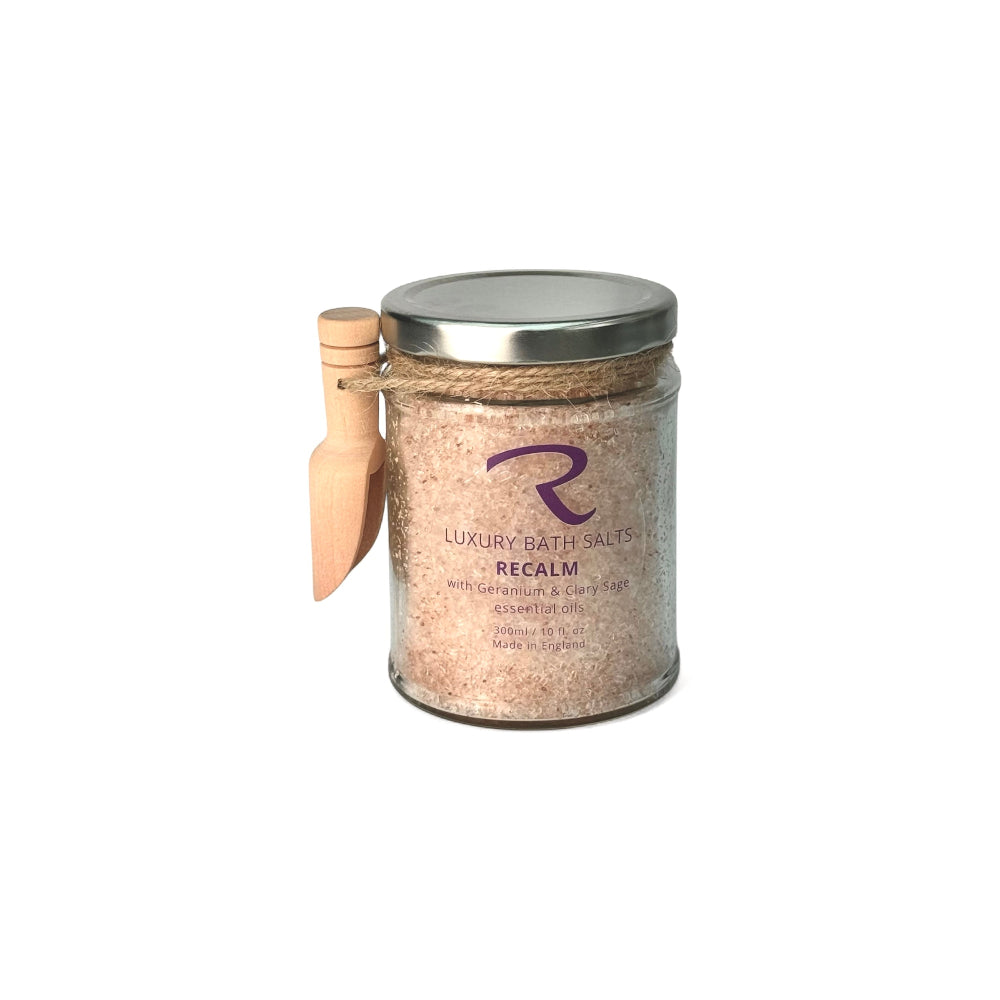 ReCalm Jar of luxury bath salts with a wooden scoop, with Geranium, Rosemary and Clary Sage, with Epsom and Himalayan and Minerals to ease tension and pain and deeply relax your muscles.