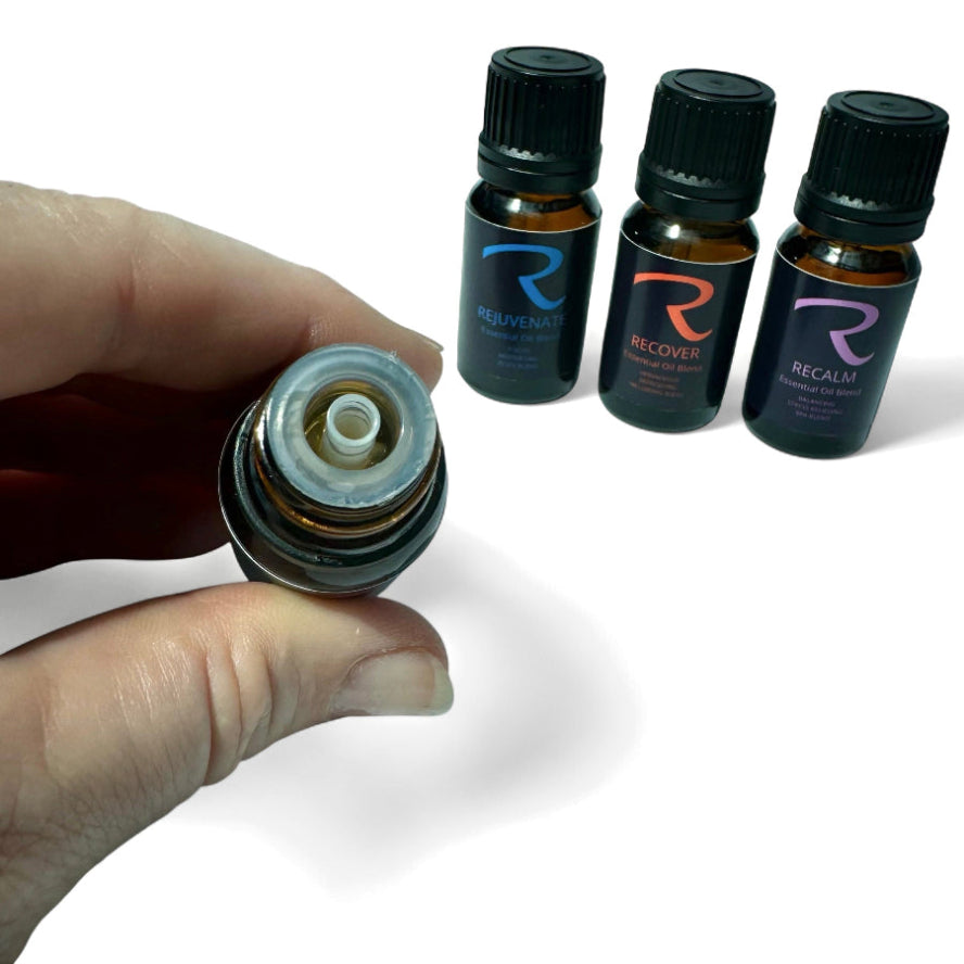 Dropper Bottle of Essential Oil Blends Relax, Rejuvenate, Recover and ReCalm