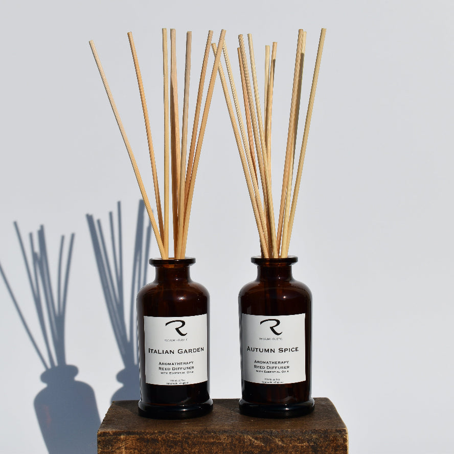 Two Reed Diffusers with white labels in Apothecary Italian Design Reed Diffusers 