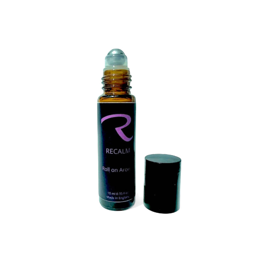 Roll-on aromatherapy called ReCalm, ReCalm Holistic's Signature Blend, to destress, for balancing women's hormones, Spa Reminiscent