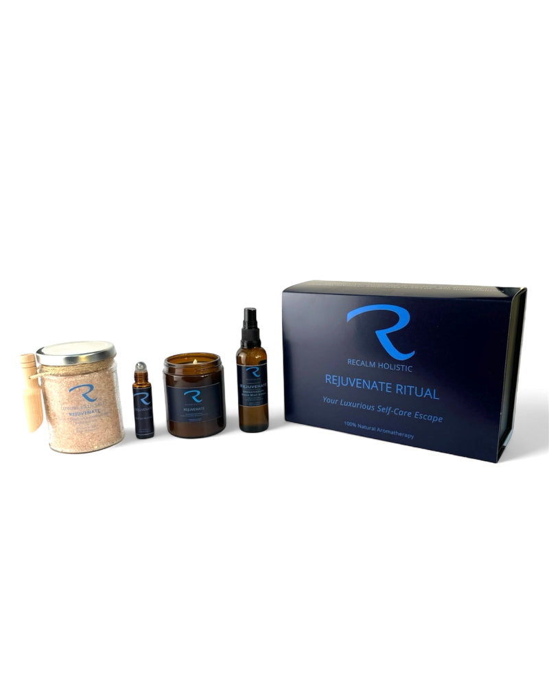 Collection of Rejuvenate products by ReCalm Holistic to match aroma for your weekly wellbeing ritual, Rejuvenate Bath Salts, Rejuvenate Pulse Points, Rejuvenate Aromatherapy Candle, Rejuvenate Room Mist Spray