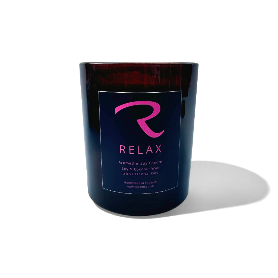 Amber glass candle with pink logo and 'Relax' for this Relaxation Candle, Best Aromatherapy Candles