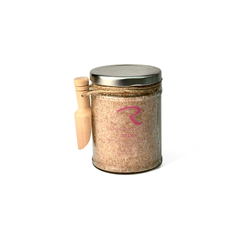 Bath Salts for deep relaxation, in clear glass jar with wooden scoop by ReCalm Holistic
