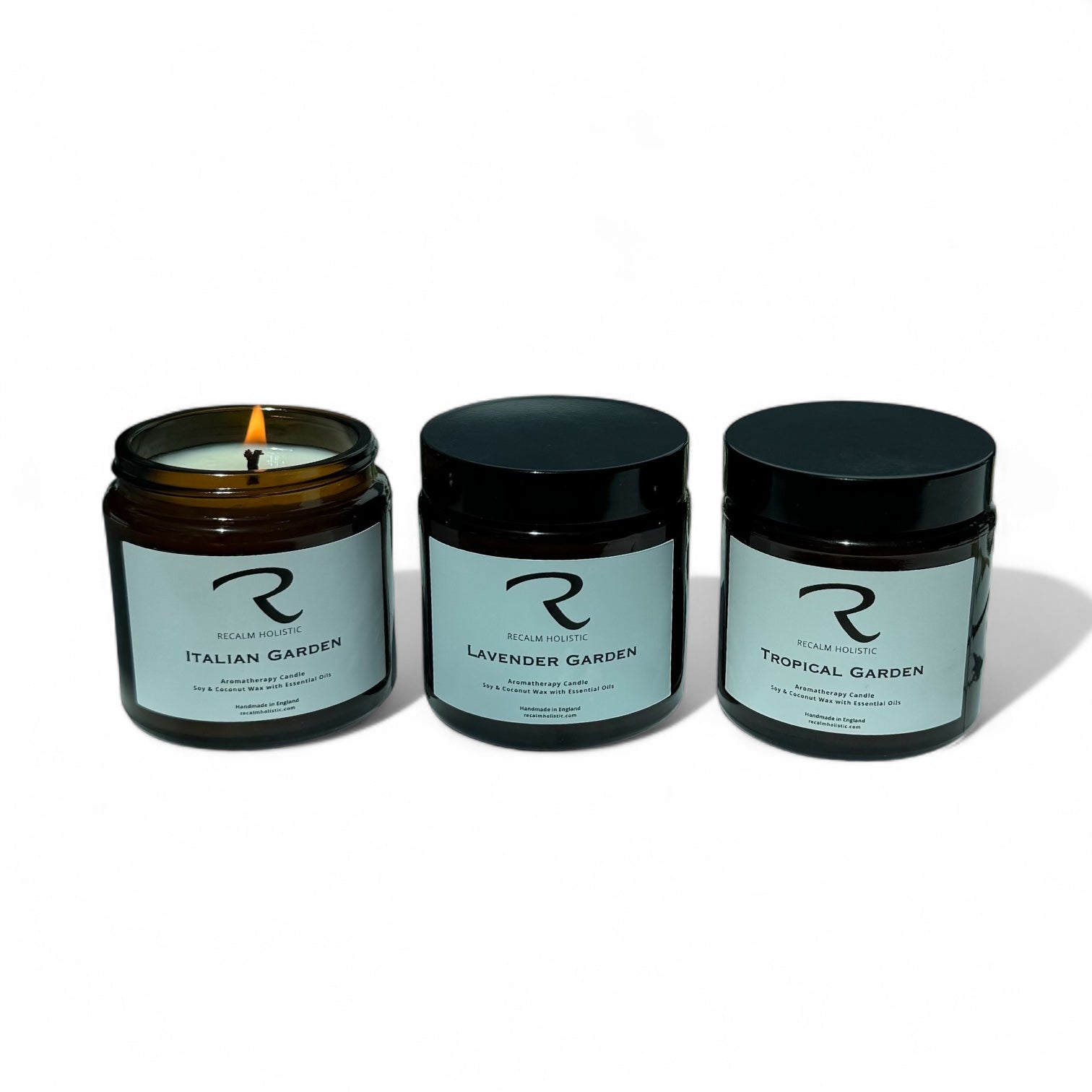 Three candles with Italian Garden label, Lavender Garden label and Tropical Garden labe.