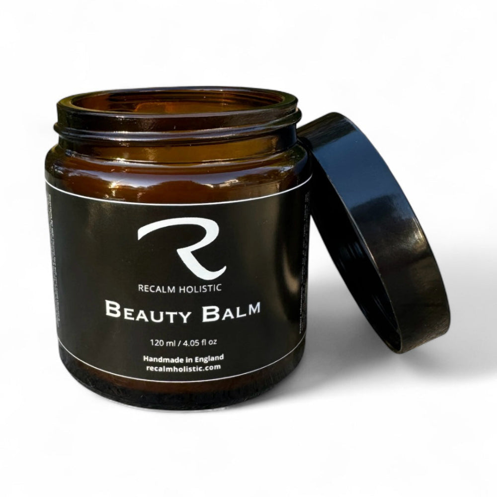 The large 120ml jar of ReCalm Beauty Balm, an intensive skin hydration formula designed for full-body care and long-term skin barrier protection.