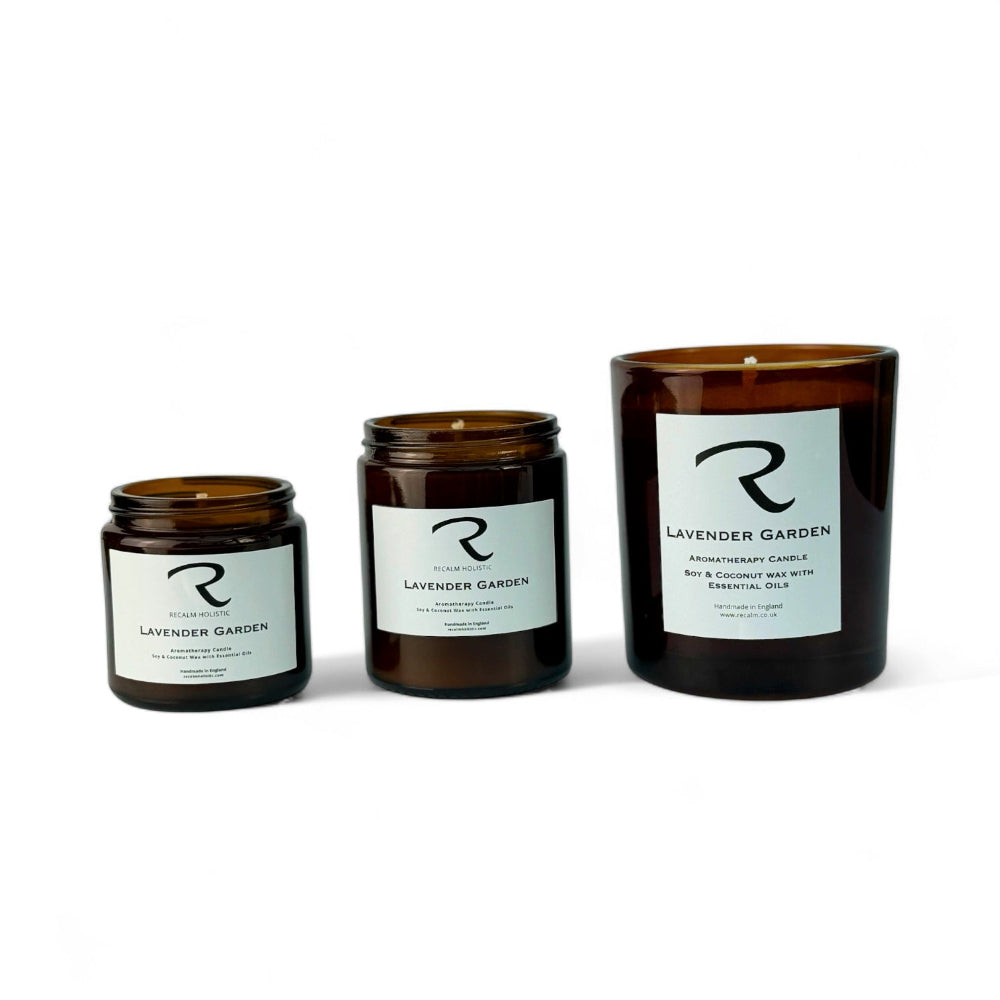 Three sizes of Lavender Garden aromatherapy amber jar candles—120ml, 180ml, and 300ml—lined up on a white background by Recalm Holistic